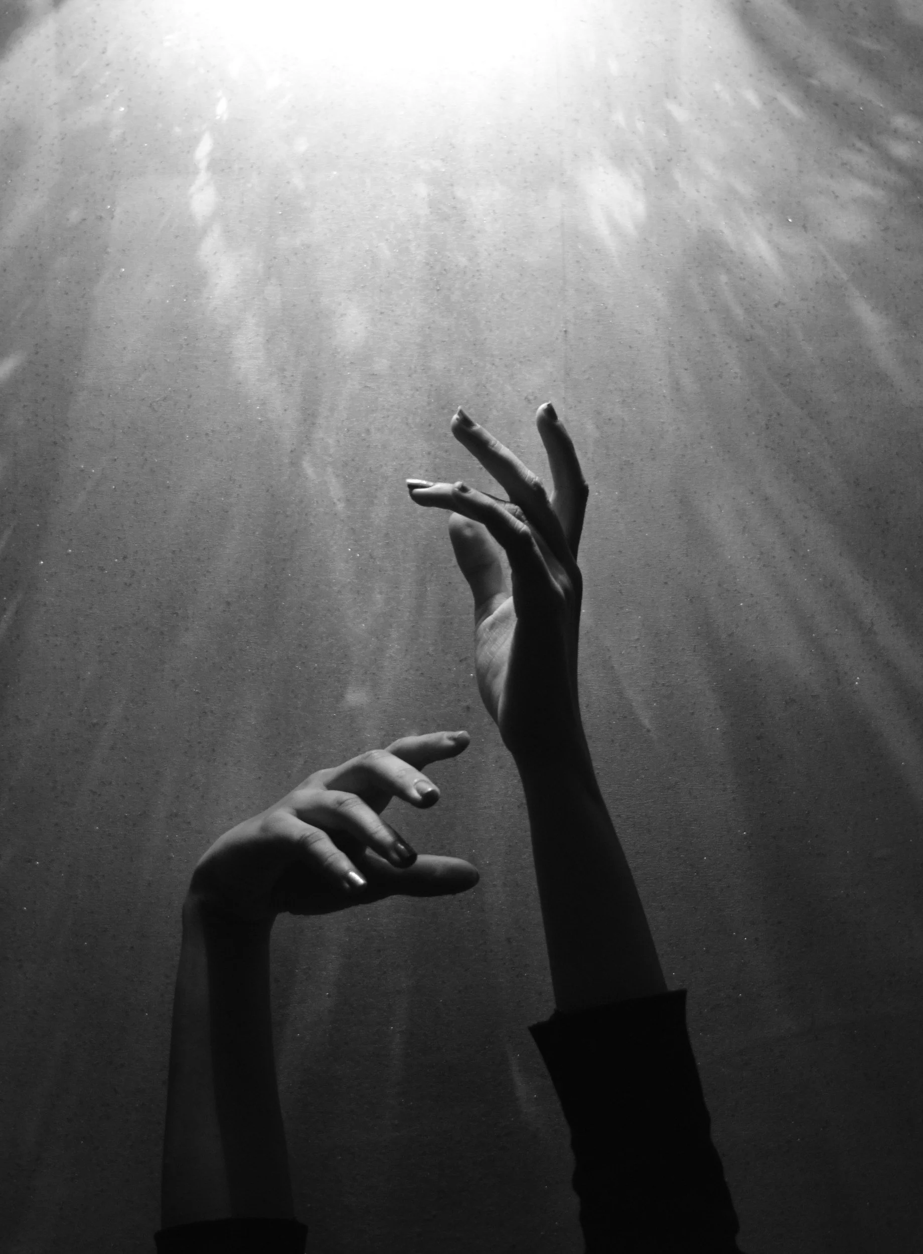 Hands working together